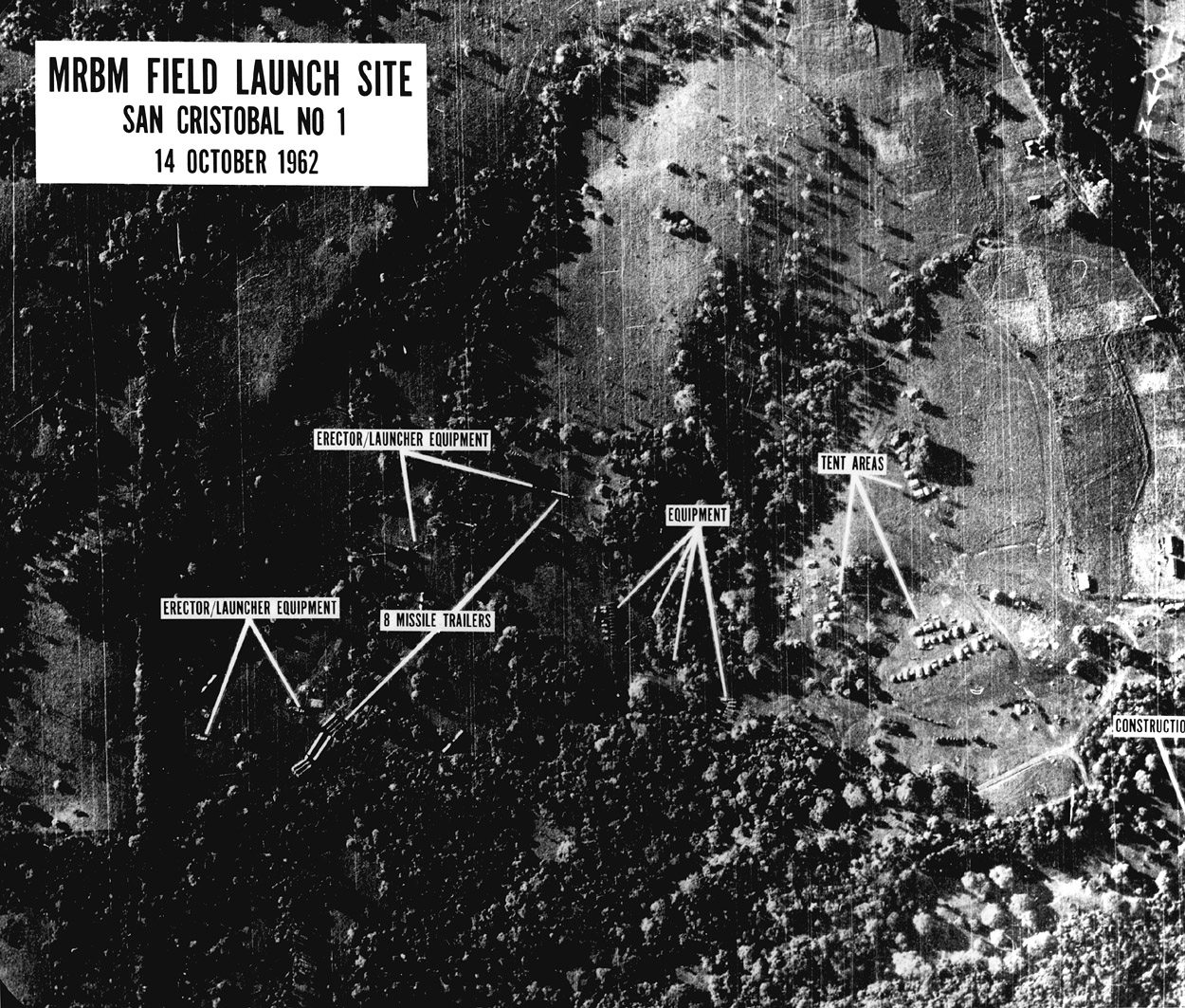 CIA-annotated U-2 reconnaissance photograph of MRBM Field Launch Site at San Cristóbal, Cuba, 14 October 1962 — showing erector/launcher equipment, missile trailers, and tent areas in a clearing surrounded by palm trees